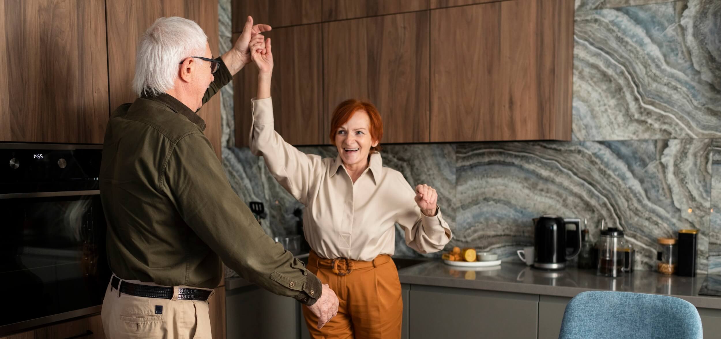 couple dancing in kitchen